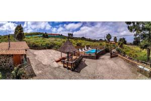 an aerial view of a house with a swimming pool at Casa El Moral in Las Palmas de Gran Canaria