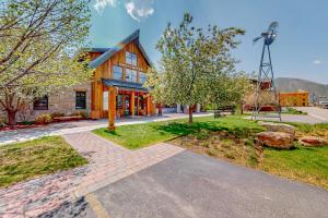 a building with a windmill in front of it at Sweet Retreat at Sweet Water in Hailey
