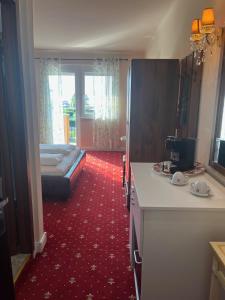 Posteľ alebo postele v izbe v ubytovaní Hotel Al Faro Lodge am See