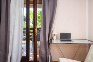 Televízia a/alebo spoločenská miestnosť v ubytovaní Vacation house Anna