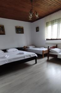 Postel nebo postele na pokoji v ubytování Drijenak Nature Escape
