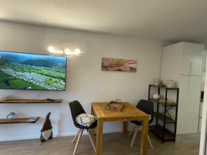 Kuchyň nebo kuchyňský kout v ubytování Charmant studio en pleine nature