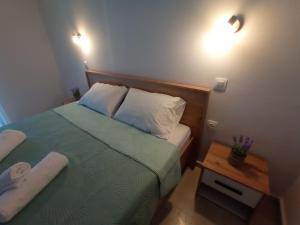 Posteľ alebo postele v izbe v ubytovaní Hermes Comfort