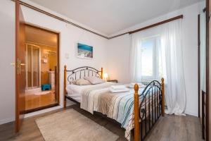 Posteľ alebo postele v izbe v ubytovaní Vacation house Anna