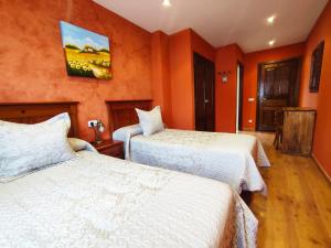 Cama o camas de una habitación en Hotel Rural Pajarapinta