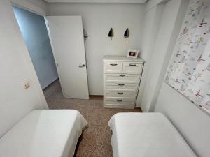 Łóżko lub łóżka w pokoju w obiekcie Alquileres Morasol - RECIÉN REFORMADO ZONA CENTRO