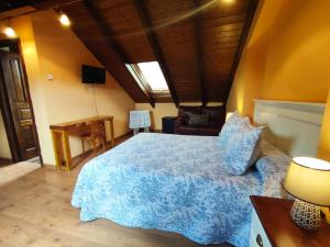 Cama o camas de una habitación en Hotel Rural Pajarapinta