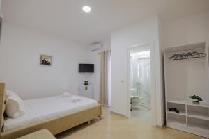 Ένα ή περισσότερα κρεβάτια σε δωμάτιο στο Relaxing Escape Rooms