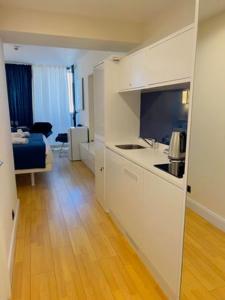 Kuchyň nebo kuchyňský kout v ubytování #Orbi-city