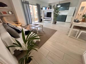 A television and/or entertainment centre at Alquilaencanarias- Medano Beach Tarajal