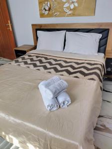 Ένα ή περισσότερα κρεβάτια σε δωμάτιο στο Sofia's House