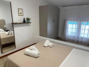 Postel nebo postele na pokoji v ubytování Seafront Family Apartment Ellie