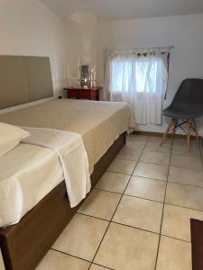 Postel nebo postele na pokoji v ubytování Seafront Family Apartment Ellie