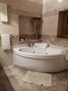 Ένα μπάνιο στο La Casa di Thor