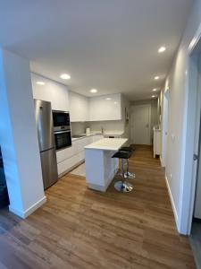 Kuchyňa alebo kuchynka v ubytovaní Apartamento Arousa Mar
