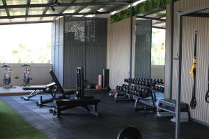 a gym with chairs and exercise equipment in a room at Hotel Taburiente S.C.Tenerife in Santa Cruz de Tenerife