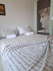 Cama o camas de una habitación en Casa Baleia Laranja Ocean-Front