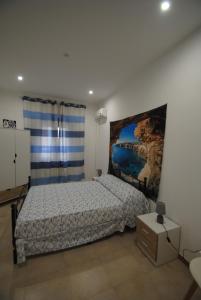 Postel nebo postele na pokoji v ubytování Casa Cinisi - Casa Vacanze