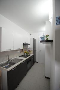 Kuchyň nebo kuchyňský kout v ubytování Casa Cinisi - Casa Vacanze
