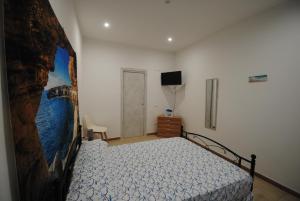 Postel nebo postele na pokoji v ubytování Casa Cinisi - Casa Vacanze
