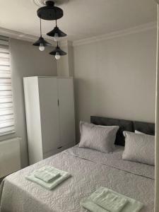 Postel nebo postele na pokoji v ubytování Hk Apart Trabzon + 29 fotografií