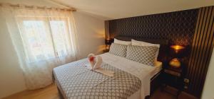 Posteľ alebo postele v izbe v ubytovaní Gimy Villa&App 1 Porec