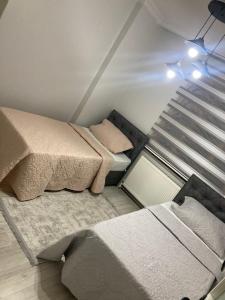 Postel nebo postele na pokoji v ubytování Hk Apart Trabzon