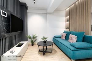 Телевізор і / або розважальний центр в Topaz - Jacuzzi and Sauna Infinity Resort