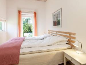 Postel nebo postele na pokoji v ubytování Holiday home Vestervig XV
