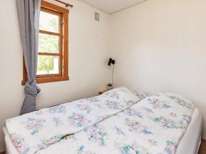 Postel nebo postele na pokoji v ubytování Holiday home Højslev XXII