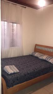 Voodi või voodid majutusasutuse Yazmin Studio Residence toas