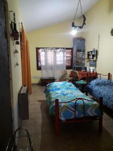 Postel nebo postele na pokoji v ubytování La Casa De Lili