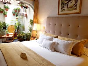 Antara Hotel & Suites - Miraflores房間的床
