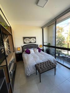 Postel nebo postele na pokoji v ubytování Apartamento BALKVIEW Centro SJ
