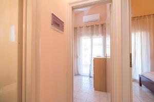 Postel nebo postele na pokoji v ubytování hespéra Summer House