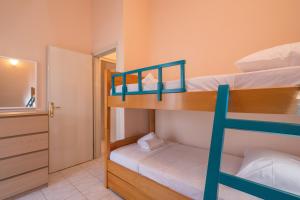 Postel nebo postele na pokoji v ubytování hespéra Summer House