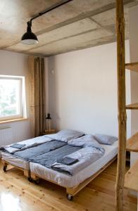 Posteľ alebo postele v izbe v ubytovaní Trafo Base Camp