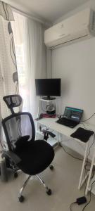TV a/nebo společenská místnost v ubytování Confortable apartmento en Ricaurte cundinamarca + 14 fotografií