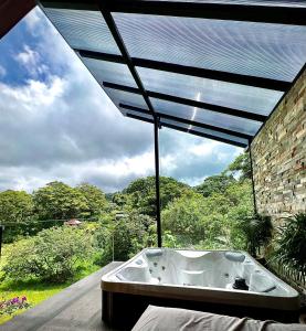 Φωτογραφία από το άλμπουμ του Cabañas Hoja Verde στο Monteverde