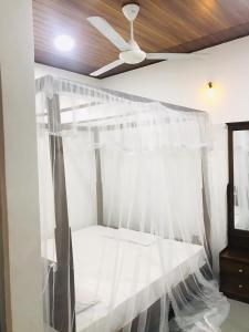 Postel nebo postele na pokoji v ubytování Senaya Villa