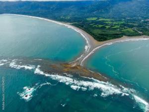 an aerial view of a beach and the ocean at Casa Linda in Uvita