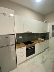 Kuchyň nebo kuchyňský kout v ubytování Casa Costera 2 lux apt