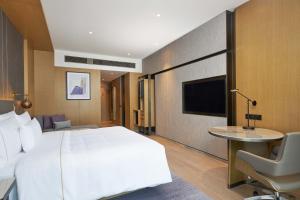 TV a/nebo společenská místnost v ubytování The Westin Zhongshan Guzhen