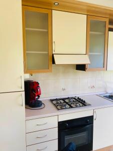 Kuchyň nebo kuchyňský kout v ubytování Casa vacanze MaMe’ + 6 fotografií