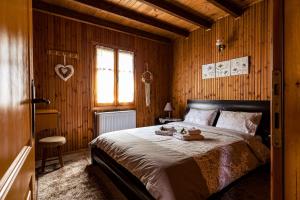 Posteľ alebo postele v izbe v ubytovaní Halatsogiannis Mansion