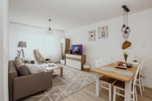 Area soggiorno di Apartament Kraju centrum z fotelem masującym