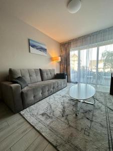 A seating area at Apartament Czarna Góra BORMIO 2