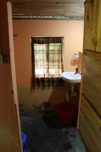 Ванна кімната в Kharmawshun Home Stay