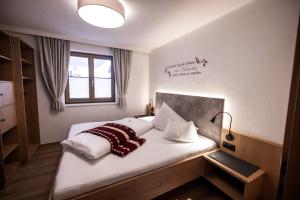 Posteľ alebo postele v izbe v ubytovaní Appartements Haus Olympia