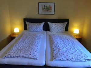 Letto o letti in una camera di Pension Chloe
